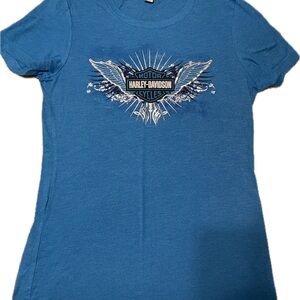 Women’s medium blue Harley Davidson, short sleeve shirt. Smoke free home.